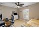 Bedroom with a bed, work desk and shuttered window at 4122 Library St, Port Charlotte, FL 33948
