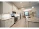 Spacious kitchen featuring granite counters, stainless appliances, and ample cabinet storage at 5435 Montego Ln, Port Charlotte, FL 33981