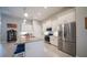 Beautiful kitchen with white cabinetry, granite countertops, stainless steel appliances, and a large island at 5435 Montego Ln, Port Charlotte, FL 33981