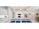 Modern kitchen with granite countertops, stainless appliances, and a large center island with seating at 5435 Montego Ln, Port Charlotte, FL 33981