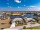 Charming single-story waterfront home in a desirable neighborhood, surrounded by lush landscaping and a private dock at 3932 Madrid Ct, Punta Gorda, FL 33950