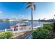 Scenic waterfront view showcasing a private boat dock and serene canal, surrounded by well-maintained properties at 3932 Madrid Ct, Punta Gorda, FL 33950