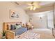 Bright bedroom with a daybed and trundle, complemented by neutral tones, modern decor, and cozy lighting, ideal for relaxation at 4046 Lubec Ave, North Port, FL 34287