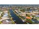 Breathtaking aerial view of waterfront homes along a winding canal system in a coastal town at 805 Brenda Ct, Punta Gorda, FL 33950