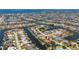 Stunning aerial view of a waterfront community with canals and beautiful homes, offering a glimpse of luxurious coastal living at 805 Brenda Ct, Punta Gorda, FL 33950