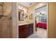 Bathroom featuring granite counters and a walk-in shower at 805 Brenda Ct, Punta Gorda, FL 33950