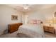 Cozy bedroom featuring a ceiling fan, neutral walls and carpet at 805 Brenda Ct, Punta Gorda, FL 33950