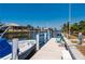Canal front home featuring a private dock, boat lift, and sunny views, perfect for waterfront living at 805 Brenda Ct, Punta Gorda, FL 33950