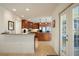 Warm kitchen featuring granite counters, stainless steel appliances, and ample cabinet space at 805 Brenda Ct, Punta Gorda, FL 33950
