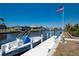 Waterfront property boasting a private dock, boat lift, and clear canal views offering an idyllic boating lifestyle at 805 Brenda Ct, Punta Gorda, FL 33950