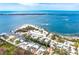 An aerial view shows the property's proximity to the water and the stunning coastal scenery at 201 Winson Ave, Englewood, FL 34223