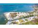 An aerial view displays the property's proximity to the coast and highlights the surrounding neighborhood at 201 Winson Ave, Englewood, FL 34223