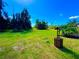 Expansive backyard with a well, perfect for outdoor activities, gardening, and enjoying the serenity of nature at 500 Woodstork Ln, Punta Gorda, FL 33982