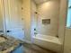 Bathroom featuring a tiled shower/tub and granite countertops at 500 Woodstork Ln, Punta Gorda, FL 33982