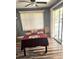 Dining area featuring a dining table with red decor, natural lighting, and wood-look floors at 1174 Victoria Ave, Port Charlotte, FL 33948