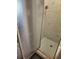 Shower with blue tile and glass door at 1174 Victoria Ave, Port Charlotte, FL 33948