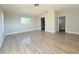Spacious living room with lots of natural light and wood flooring at 1438 Navigator Rd, Punta Gorda, FL 33983