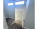 A staircase with wood flooring and white walls at 1438 Navigator Rd, Punta Gorda, FL 33983