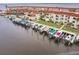 Beautiful waterfront condo with private boat slips, lush landscaping, and stunning views of the water at 1 Colony Point Dr # A19, Punta Gorda, FL 33950