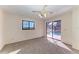 Bedroom featuring neutral carpet with sliding doors that view the pool at 1115 Venture Ct, Punta Gorda, FL 33983