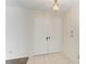 Inviting foyer with double doors, neutral walls, and tiled flooring at 1115 Venture Ct, Punta Gorda, FL 33983