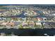 Wonderful aerial of property's ideal waterfront positioning and the surrounding neighborhood at 5430 Almar Dr, Punta Gorda, FL 33950
