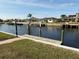 The property features a private dock with canal access at 721 Brenda Ct, Punta Gorda, FL 33950