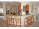 Kitchen bar with seating overlooking the kitchen area, great for socializing at 721 Brenda Ct, Punta Gorda, FL 33950