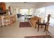 Comfortable living room with tile floors, sliding glass doors, and plenty of natural light at 721 Brenda Ct, Punta Gorda, FL 33950