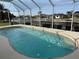 The screened-in pool offers a private outdoor retreat at 721 Brenda Ct, Punta Gorda, FL 33950