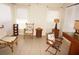 Sitting area with natural light, bamboo furniture, and tiled flooring at 721 Brenda Ct, Punta Gorda, FL 33950