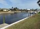 The property offers direct access to the canal at 721 Brenda Ct, Punta Gorda, FL 33950