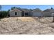A charming single-Gathering home features a light gray stucco exterior, attached garage, and a neatly landscaped yard at 17439 Edgewater Dr, Port Charlotte, FL 33948
