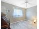 Inviting bedroom featuring light colored wood floors at 18395 Edgewater Dr, Port Charlotte, FL 33948