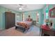 Comfortable bedroom with neutral carpet, ceiling fan, and window at 18395 Edgewater Dr, Port Charlotte, FL 33948