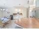 Bright eat-in kitchen featuring white appliances and tile floors at 18395 Edgewater Dr, Port Charlotte, FL 33948
