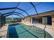 Bright and sunny screened pool area with direct access to home and backyard at 18395 Edgewater Dr, Port Charlotte, FL 33948