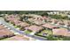 Aerial view of a well-maintained community featuring beautiful homes and landscaping at 24157 Green Heron Dr # 27, Punta Gorda, FL 33980