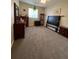 Well-lit bedroom with carpeted floors and a ceiling fan at 24157 Green Heron Dr # 27, Punta Gorda, FL 33980