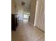 Welcoming entryway featuring tile flooring leading to the open living spaces at 24157 Green Heron Dr # 27, Punta Gorda, FL 33980