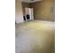 Spacious garage area with concrete flooring perfect for parking and storage needs at 24157 Green Heron Dr # 27, Punta Gorda, FL 33980