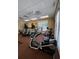 Workout facility features multiple machines and natural light, promoting a healthy lifestyle at 24157 Green Heron Dr # 27, Punta Gorda, FL 33980