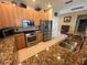 Well-lit kitchen features stainless steel appliances and granite countertops at 24157 Green Heron Dr # 27, Punta Gorda, FL 33980