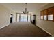 Spacious living room with high ceilings and large windows for natural light at 24157 Green Heron Dr # 27, Punta Gorda, FL 33980