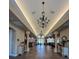 Elegant lobby features high ceilings, chandeliers, and stylish decor, creating a welcoming atmosphere at 24157 Green Heron Dr # 27, Punta Gorda, FL 33980