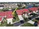 An aerial view shows the community homes, the canal, and mature palm trees at 3830 Bal Harbor Blvd # 5, Punta Gorda, FL 33950