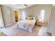 Cozy bedroom with a beach-themed bed, walk-in closet, and serene decor for ultimate relaxation at 3830 Bal Harbor Blvd # 5, Punta Gorda, FL 33950