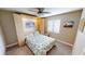 This bedroom features a murphy bed with built in lighting and beach themed wall art at 3830 Bal Harbor Blvd # 5, Punta Gorda, FL 33950