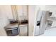 This laundry room features a side-by-side washer and dryer next to a refrigerator with white cabinets above at 3830 Bal Harbor Blvd # 5, Punta Gorda, FL 33950