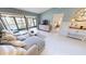Relaxing living room with a comfortable sofa with easy access to the outdoors and bedroom at 3830 Bal Harbor Blvd # 5, Punta Gorda, FL 33950
